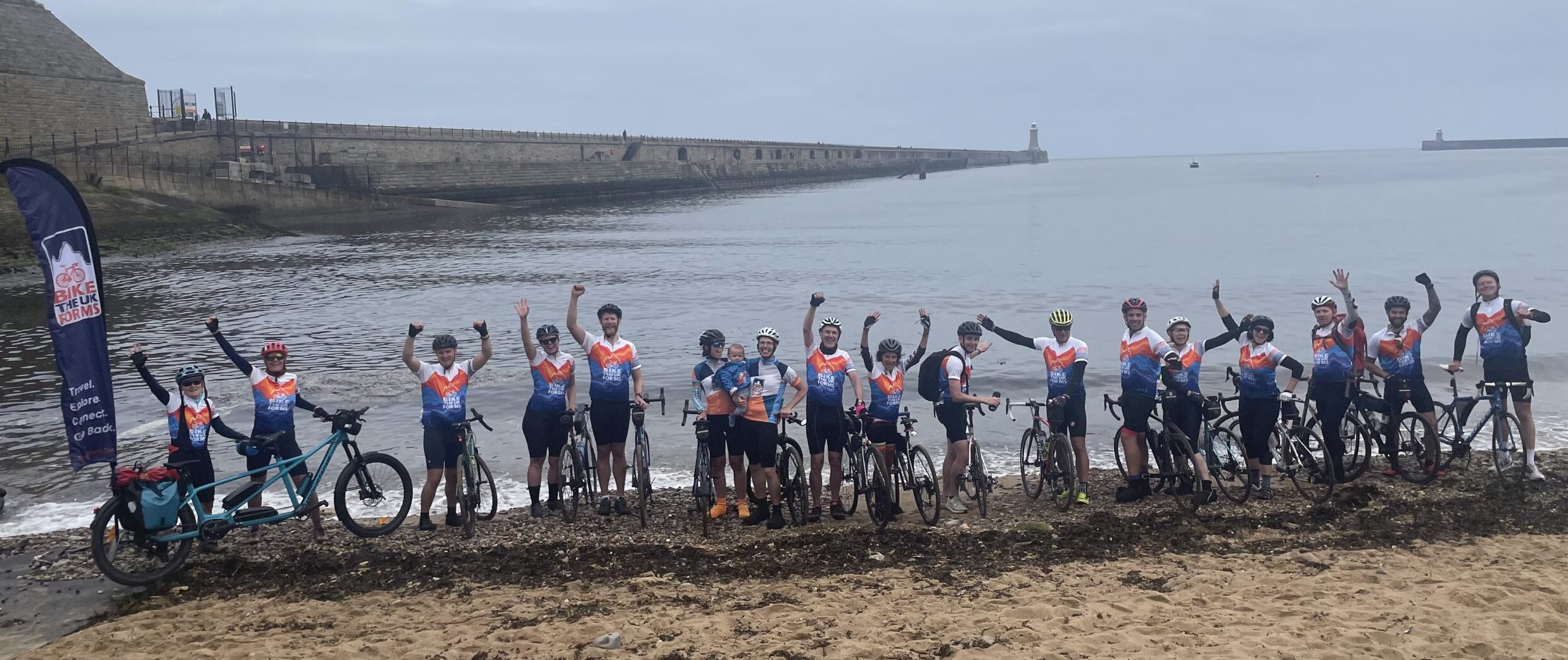 Celebrating the finish in Tynemouth having ridden from Whitehaven on the Sea to Sea