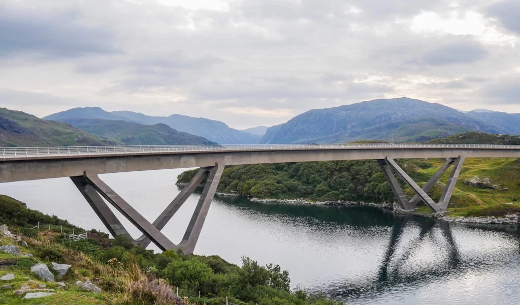 You get to experience cross the Kylesku Bridge when cycling in the Highlands on the North Coast 500, also known as the NC500.