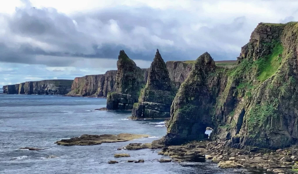 The rugged coastal views you get to see when cycling in the Scottish Highlands.