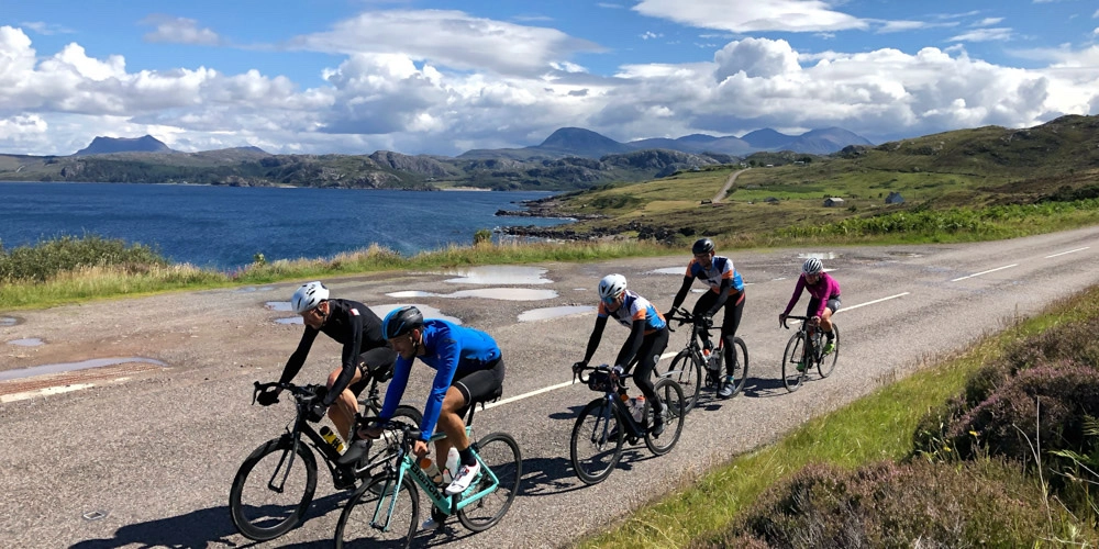 Cycling amongst giants in the Scottish Highlands on the North Coast 500 or NC500.